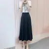 Liquidación de Verano 2026 Conjunto de Dos Piezas de Moda y Versátil: Blusa de Gasa + Falda de Cintura Alta 310/D2