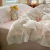 Conjunto de cuatro piezas de encaje de algodón puro estilo princesa coreana, conjunto de tres piezas de funda de edredón para dormitorio de algodón lavado estilo fresco y cremoso de Instagram
