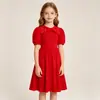 Moda Verão para Meninas Gola Redonda Manga Curta Cor Sólida Laço Lantejoulas Pérolas Vestido Elegante para Banquete Roupa Infantil Atacado