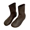 Outono/Inverno 2026 Novas Botas Meia Bico Redondo Elástica Femininas Botas Emagrecedoras Fundo Plano Aumentadoras de Altura Temperamento Versátil Puxar para Vestir Cano Alto Botas Longas