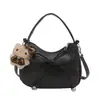 Bolso de mujer con diseño de nicho único 2026 nuevo bolso cruzado versátil bolso de mano exquisito bolso de mano de moda super popular