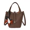 Bolso de Mano Pequeño Texturizado Transfronterizo para Mujer 2026 Nuevo Vintage Versátil Elegante Bolso Cubo para Viaje Diario Bolso de Hombro Único Bolso Cruzado