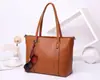 Camada Superior Outono e Inverno Couro Bovino Moda Feminina Bolsa Bolsa Tote Portátil Transversal Couro Feminina Grande Capacidade Bolsa de Compras