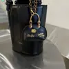 2025 Nueva Bolsa Hecha a Mano de Color Claro Accesorios de Aleación Kt Saturno DIY Llavero Colgante de Bolso de Moda