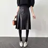 Chic coreano nueva colección de principios de otoño: Falda plisada de piel sintética versátil estilo francés, de cintura alta, longitud media, para mujer