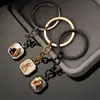 Llavero Fotográfico Cuadrado de Acero Inoxidable Sensible a la Temperatura que Cambia de Color, Superventas Transfronterizo para Hombres y Mujeres, Accesorios de Temporada de Graduación
