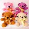 Muñeco de oso lindo boutique peluche colgante 20cm máquina de garra puesto de premios nudo regalo de boda