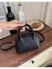 Bolso de mano de nicho transfronterizo para mujer, nuevo bolso de alta gama con patrón de lichi tipo "bolsa de pan tostado", bandolera y bolso cruzado, moderno