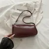 Design de nicho francês versão coreana versátil bolsa baguette padrão crocodilo bolsa de ombro retrô 2026 nova bolsa de mão bolsa de ombro
