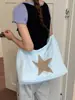Bolso de lona casual súper popular estilo coreano para mujer, nuevo modelo 2026, relajado, gran capacidad, para el día a día, de hombro y para llevar debajo del brazo