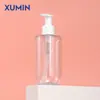 En stock Xumin 200ml botella PET blanca de hombro plano transparente/esmerilada fondo redondo cabeza de bomba PP botella dispensadora de emulsión