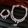 Pulsera y Collar de Doble Capa con Lazo de Perlas Cadena para Clavícula Estilo Palacio Francés Set de Joyería Versátil de Lujo Ligero para Mujeres