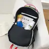 Mochila unisex para exteriores, nailon, ligera, impermeable, adecuada para estudiantes, escuela, viajes, senderismo y actividades de ocio