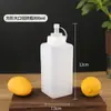 Botella exprimible cuadrada de gran calibre para salsa, material PP, botella para salsa de ensalada de tomate, gran capacidad, boca ancha, botella exprimible para gránulos Maravillosa Maravillosa botella