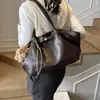Bolso de Mano de Nicho Súper Popular Transfronterizo para Mujer 2026 Nuevo Bolso de Hombro Informal Plegado de Gran Capacidad para el Trabajo