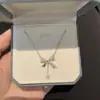 Collar de Cadena para Clavícula de Diamante Flash de Alto Grado con Lazo y Borla de Gota de Agua para Mujer, Estilo Ins Nicho, Lujo Ligero, Simple, Versátil, Elegante