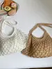 Bolso tejido para mujer para pedidos extranjeros, nuevo bolso de hombro calado de verano 2026, bolso cruzado de gran capacidad para vacaciones en la playa