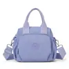 Bolso de mano para mujer de gran capacidad, bolso de hombro y bandolera de nailon casual y moderno, bolso de lona impermeable ligero de múltiples capas para mujer