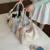 Bolso de axila de moda retro, simple y fresco, elegante bolso bandolera tipo dumpling, versión coreana de cuero encerado al aceite, bolso de hombro de moda de comercio exterior