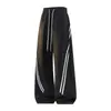 Novedades de otoño: Pantalones casuales rectos holgados para hombre con retazos a rayas de ropa deportiva retro americana