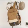 Nuevas mochilas para hombre y mujer para estudiantes de secundaria y preparatoria, gran capacidad, adecuadas para tutorías o como bolso de hombro, disponibles en dos estilos