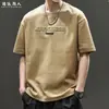 Camiseta Estampada com Letras de Marca Tendência Estilo Americano para Homens, Novo Modelo Verão 2026, Corte Solto, Tamanho Grande, Camisa Simples Respirável