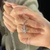Collar de Acero de Titanio con Copo de Nieve de Zirconia Giratorio para Mujer Lujo Accesible Diseño de Nicho Cadena para Clavícula Cadena para Suéter Joyería Versátil de Moda
