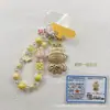 Llavero Periférico Labubu Colgante Bolsa Dorada Oro Puro 999 Objeto de Regalo Colgante Shuibeili En Vivo Wholesale
