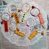 Llavero de acrílico de doble cara con texto de caqui, lindo, creativo y práctico, pequeño regalo, colgante de anillo de alambre