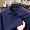 Moda masculina no atacado: suéter de malha popular com gola dobrável e mangas compridas, nova camisa básica lisa casual de outono e inverno para homens
