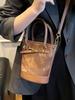 Bolso de Cubo Portátil para Mujer Estilo Coreano Primavera Nuevo Moda de Alta Gama Combinable Bolso de Hombro 2025 Diseño Nicho Bolso para Mujer