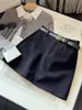 Falda midi de lana línea A anti-exposición para chica bajita mujer otoño nuevo estilo versión coreana cintura alta ajustada al cuerpo falda corta
