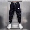 Novas Calças Casuais Cinzas 2024 Primavera e Outono Moda Coreana Masculina Calças Esportivas Cropped