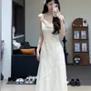 Nuevo vestido slip popular de estilo chino con hombros descubiertos y jacquard para mujer, nuevo modelo verano 2025, estilo vacacional, elegante, vestido largo que ciñe la cintura