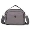 Elegante bolso cruzado de nailon para mujer, con múltiples compartimentos, diseño ligero y forma cuadrada casual, perfecto para llevar un teléfono