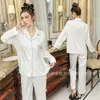 Pijama de Seda Gelada para Mulheres Primavera e Outono de 2026, Conjunto de Manga Longa e Calça Longa com Strass, Conjunto de Duas Peças de Homewear Simples de Alta Qualidade Que Pode Ser Usado Fora