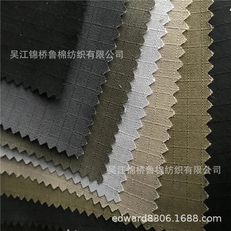 涤棉小方格子布提花布.jpg