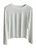 Una opción popular: esta camiseta holgada de manga larga es perfecta para llevar sola o como prenda de capas, y tiene un efecto adelgazante. Es un nuevo estilo para la temporada otoño/invierno 2026