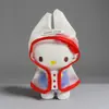 El Colgante de Hello Kitty Se Puede Usar para Vestir el Peluche Muñeco con Ropa, Conjunto de Falda y Impermeable de Puntos