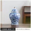 Tarro de té de cáscara de mandarina Xinhui cerámica gran capacidad Especial caja de embalaje caja vacía porcelana azul y blanca tarro general tarro sellado venta al por mayor