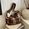 Bolsa de Lona Casual de Gran Capacidad para Mujer 2025 Nuevo Bolso Cruzado Versátil para Viajes Diarios Bolso Tote Relajado Bolso Cubo