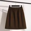Roupas Femininas Plus Size para Mulheres Gordas Outono Novo Estilo 2025 Moda e Versátil Efeito Emagrecedor Cintura Elástica Saia de Lã de Comprimento Médio Saia Curta para Mulheres