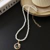 Collar con colgante de perlas vintage con pintura al óleo de goteo de la época media para mujer, nuevo estilo chino, estilo nacional, cadena de lana ligera de lujo para clavícula de nicho a la moda.
