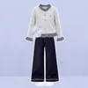Conjunto de dos piezas para niñas de principios de otoño 2026: top de moda estilo coreano con retazos de cuadros y pantalones vaqueros anchos versátiles