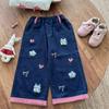 Calça Jeans de Outono para Meninas 2026 Novo Estilo Moda Desenho Bordado Xadrez Patchwork Casual Calça de Perna Larga para Bebês