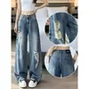 Jeans vintage de talla grande con rotos y dobladillo curvo para mujer, al por mayor, en stock, pantalones rectos de pierna ancha, holgados, de cintura alta, para adelgazar, de verano