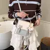 Mochila Femenina de Nicho de Moda 2026 Nuevo Modelo Estilo Dulce Bolsa Cuadrada Pequeña para Viajes y Desplazamientos Bolso Cruzado