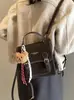 Mochila Retro Transfronteriza de Moda para Mujer 2025 Nueva Tendencia Versátil Bolso de Mano Estudiante Clase Casual Bolso de Mujer