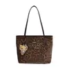Bolso tote nuevo con estampado de leopardo 2026, gran capacidad, bolso de hombro, bolso de mano, estilo coreano, versátil para ir al trabajo, cuero suave, bolso de axila para mujer