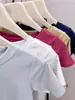 Camiseta Casual Versátil Slim-Fit de Manga Curta, Novo Estilo 2026, com Gola Redonda Elegante e Ombros Normais, Exclusivamente para o Sudeste Asiático